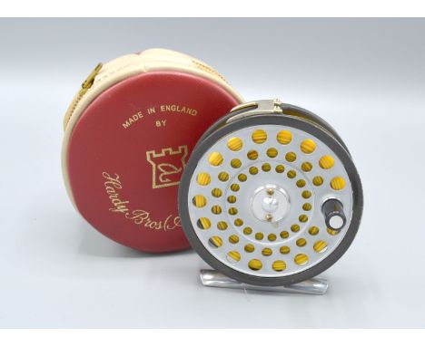 L R H Lightweight multiplier fishing reel by Hardy Brothers Limited, 8cms diameter with original case 