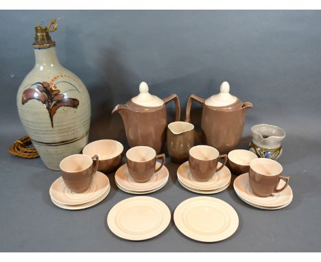 A David Leach Studio Pottery Spinware Lamp Base with floral decoration, 30 cms tall together with a Seth Cardew small jug and