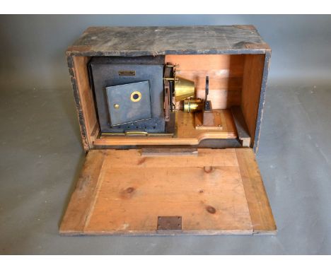 A Magic lantern by W. Butcher and sons within box. 