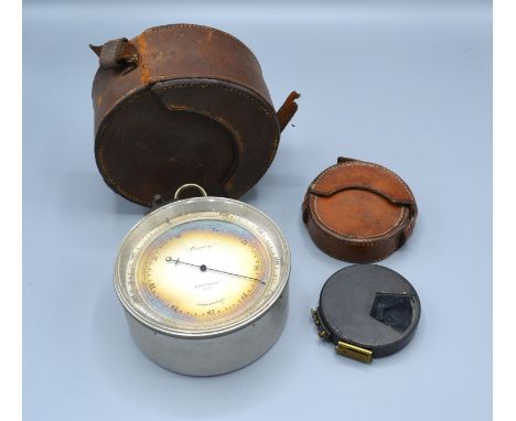 A Compensated Barometer by Stanley London numbered 1471 within outer leather carrying case together with a similar Japaned su