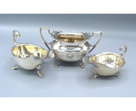 A Birmingham silver two handled sucrier together with two Birmingham silver sauce jugs, 11oz 
