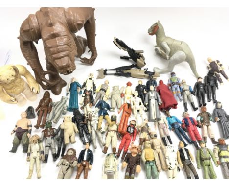 A Collection of Vintage Playworn Star Wars Figures including an Anakin Skywalker with a Rancor. A Tauntaun. And Speader bike.