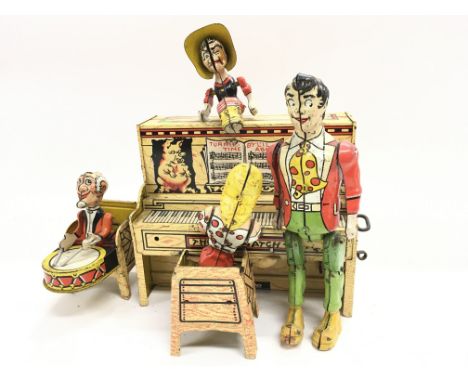 A Unique Art Manufacturing Co Lil Amber Dogpatch Band Wind up.