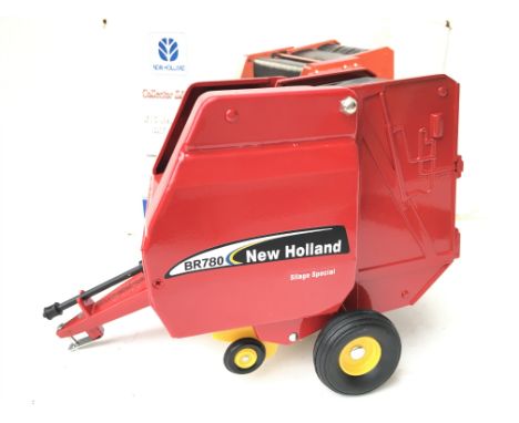 A Boxed New Holland Baler #BR780 scale 1:16.