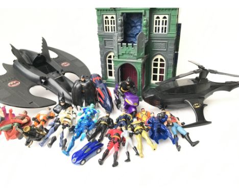 A Collection of Vintage Batman Figures. Vehicles and a Wayne Manor.