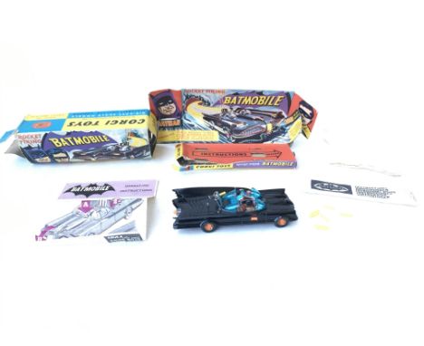 A corgi Batmobile with box (worn) and instructions with rockets. 267.