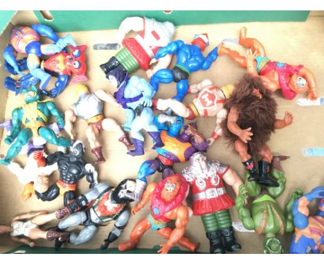 A Box Containing A Collection of Vintage He-Man Figures and a Castle Grey Skull.