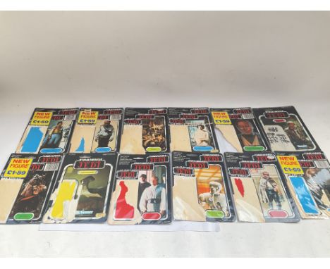 Collection of 12 vintage Star Wars card backs.