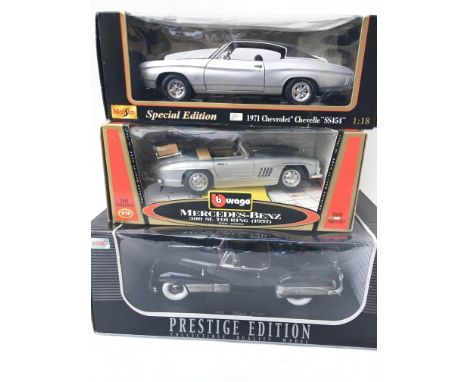 3 Boxed 1:18 Scale Die-Cast Vehicles. A Maisto 1971 Chevrolet. A Burago Mercedes-Benz and a anson 1938 Buick.(3) all boxed.