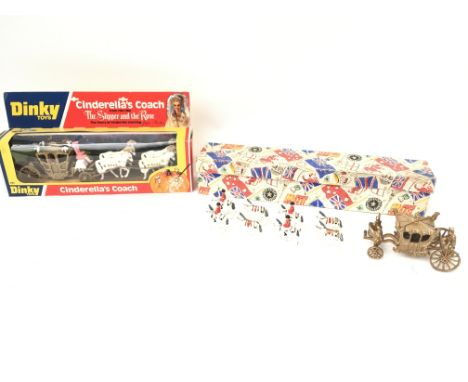 A boxed Dinky Cinderellaâ€™s coach and a Crescents toys vintage precession carriage.