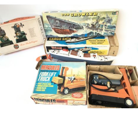 Lot containing Box (worn) Tri-ang cargo ship A/F Revell uss growler. Airfix four stroke engine. Hercules RC fork lift truck.