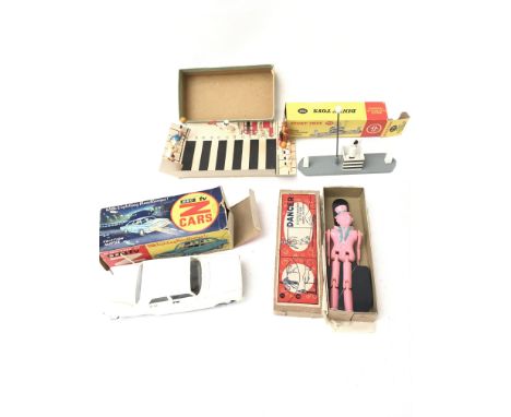 A Boxed Fairylite Z Cars. A Dinky police Controlled crossing boxed #753 and a vintage Plastic Dancing toy.etc.