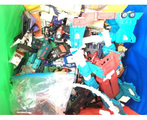 A Box Containing a Collection of Vintage G1 Transformers.
