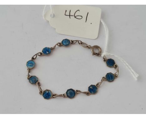 A metal and enamel child's religious panel bracelet