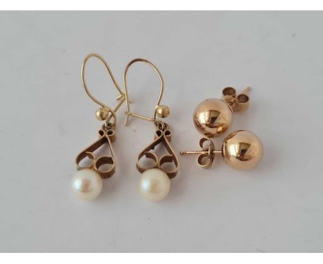 A pair of vintage ball stud earrings and pearl drop earrings both 9ct