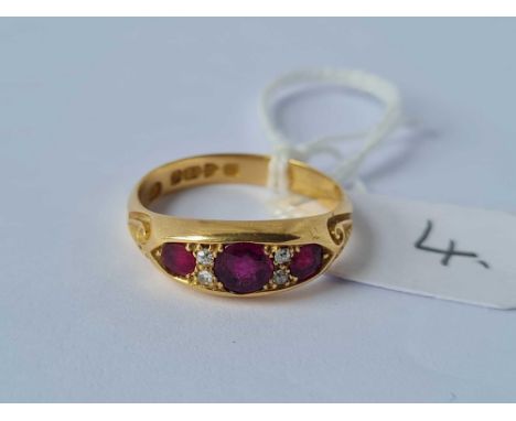 A seven stone ruby and diamond ring 18ct gold Chester size P    4.6 gms