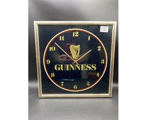 A Guinness wall clock