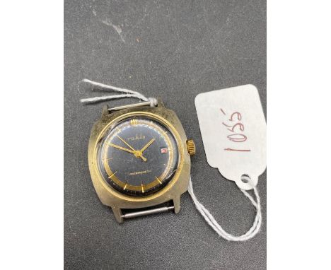 A gents black faced vintage wrist watch by RUHLA with seconds sweep and date aperture W/O