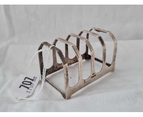 A five bar toast rack on bracket feet, 3" wide, Sheffield 1938 by EV