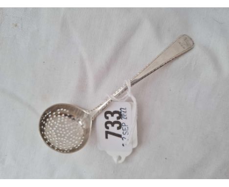 A small Georgian bottom marked sugar ladle with crest by TC