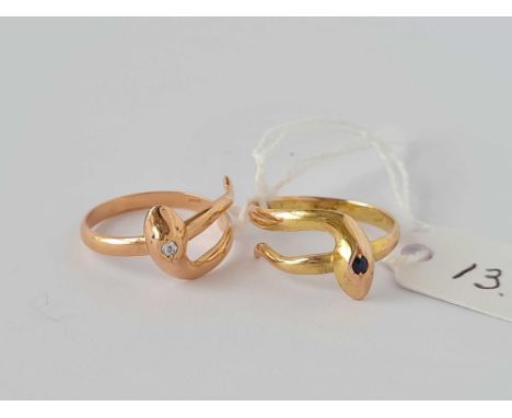 A VINTAGE PAIR OF GOLD DIAMOND AND SAPPHIRE SNAKE RINGS 14CT GOLD SIZE O   