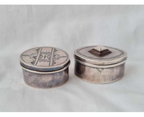 A marquise shaped patch jar and cover and another oval, 1.75” wide, unmarked