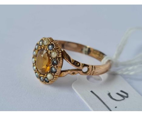 A oval citrine and pearl border ring (one pearl replaced) 9ct size R     2 gms