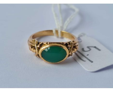 A Victorian jadeite stone ring set in gold with fancy shoulders size K   3.4 gms