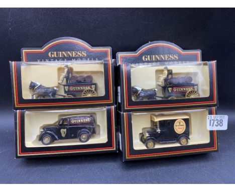 Four boxed Guinness Vintage model transport vans  