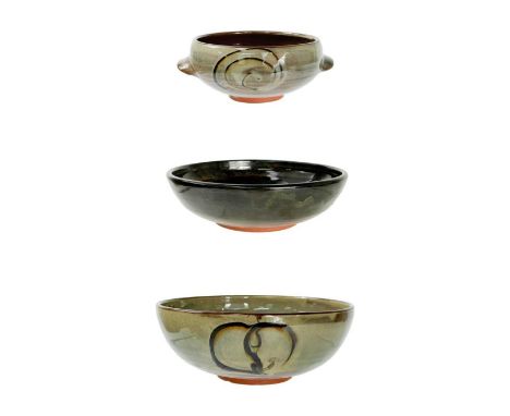 Three Margaret Leach bowls, from her time in the early 1950s at the Taena Pottery, each with impressed pottery marks, the lar