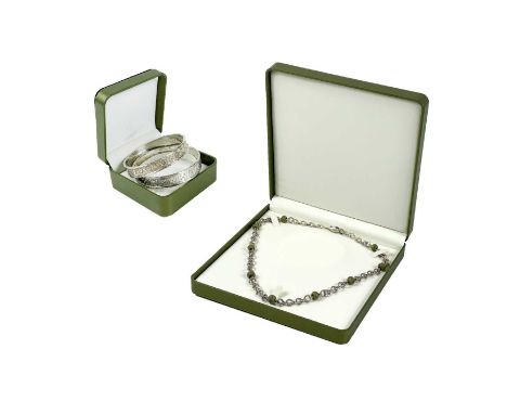 Christine POVEY  A silver link necklace with green beads length 53cm (unclasped) together with two silver bangles, each hallm