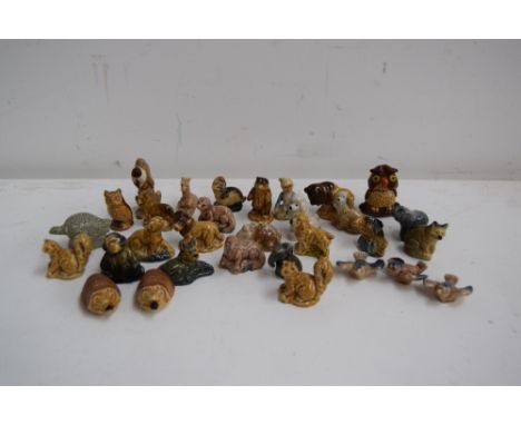 A collection of Wade Whimsies including the bison, lions, dogs, bears, otters, dinosaur, turtle, gnome, giraffe, henghogs, el