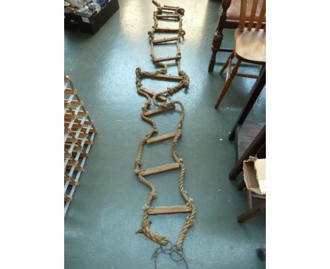 An early 20th century pine and hemp rope ships ladder, 305cm