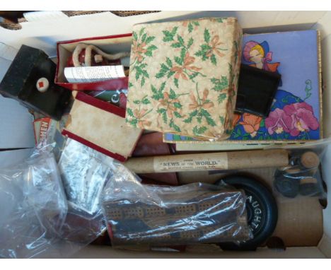 An interesting box of items to include postcards with stamps and correspondence from the 1950s; vintage magicians items such 