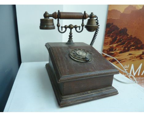 Vintage rotary dial telephone  with wood and brass handset and internal bell