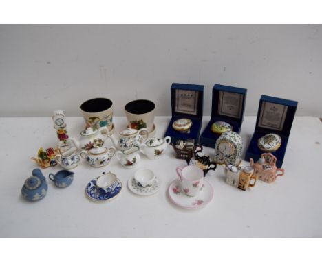 A quantity of decorative china pieces including various miniature items namely Coalport, miniature teapots, a miniature Wedgw