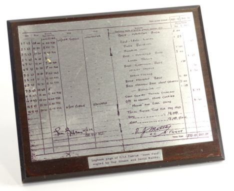 A printed stainless steel plaque depicting the log book page of Flight Lieutenant Taerum, of the "Dams Raid" signed by Guy Gi