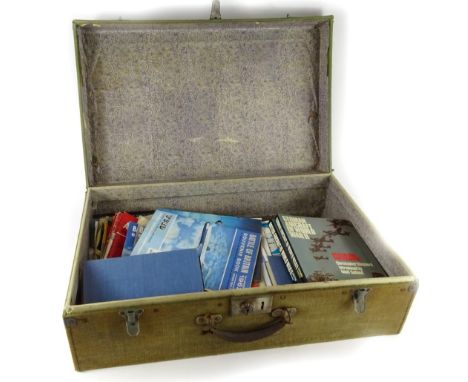 A vintage canvas trunk and a quantity of war books, Battle of Britain souvenirs, Air Pictorial, Flying Review and other magaz