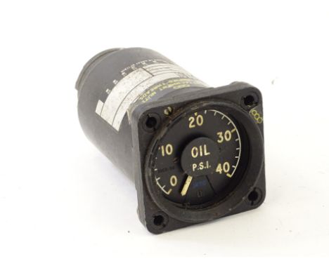 A vintage aeroplane engine dial tachometer by Smiths, with Arabic dial marked oil PSI number 61467437, 7cm high.