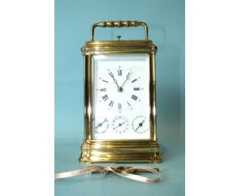 A 19th century French brass repeating carriage clock, the enamel dial with alarm, date and day of the week subsidiaries, the 