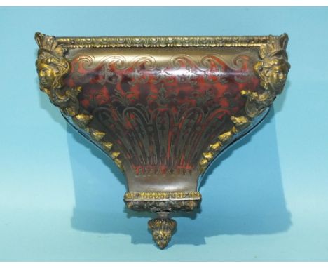 A 19th century Boulle-work clock bracket with gilt metal figural mounts, frieze and pendant base, 18.5cm wide, 15cm high, 12c