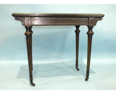 An ivory-inlaid ebonised wood fold-over card table on telescopic fluted legs with castors, 89cm square.