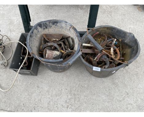 TWO BUCKETS OF HORSE SHOES AND A VINTAGE TIN OF  HARDWARE 