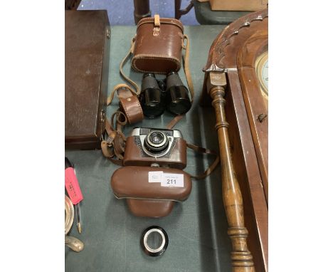 A VINTAGE GERMAN CAMERA WITH CASE AND A PAIR OF BINOCULARS WITH CASE 