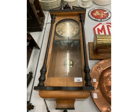 A LONGCASE CHIMING WALL CLOCK 