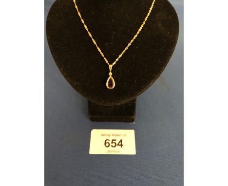 A 9CT AMETHYST TEAR DROP PENDANT AND CHAIN, APPROX TOTAL GROSS WEIGHT 1 GRAM 