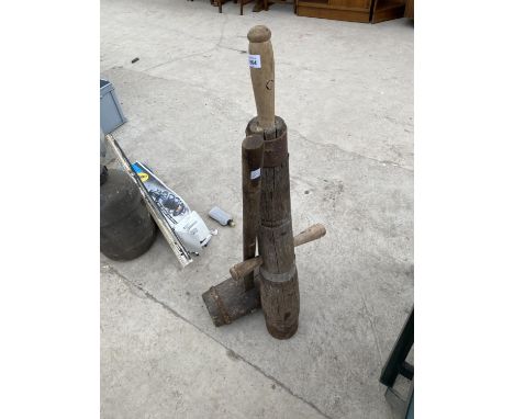 A VINTAGE MALLET AND PULPER 