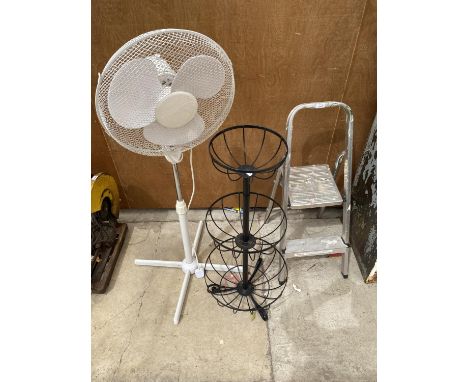 A THREE TIER METAL BASKET PLANTER, A SET OF ALLOY STEPS AND A PEDESTAL FAN 