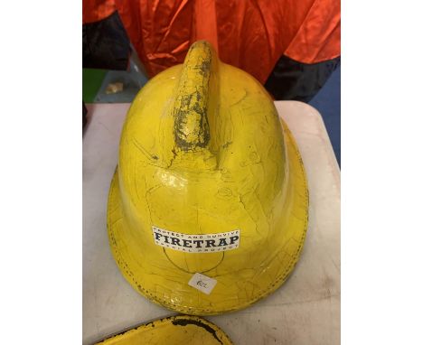 A FIRETRAP FIREMANS HELMET 