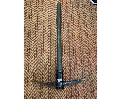 A MILITARY PICK AXE 